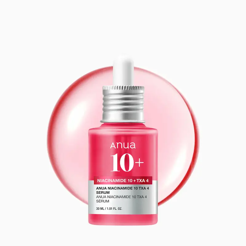 Anua Niacinamide Serum 10% + TXA 4% for dark spot correcting and oil control in a 30ml pink bottle